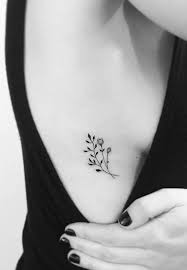 36 Beautiful Minimalist And Tiny Tattoos For Every Girl Colorful Tattoos Thick Tattoos Sma Rib Tattoos For Women Small Shoulder Tattoos Small Flower Tattoos