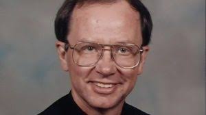 Charges: St. Paul priest strangled by passenger in car