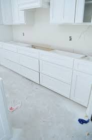 When It Comes To Building A Dream Kitchen You Can T Go Wrong With White From The Look Updating House Kitchen Paint Color Inspiration White Kitchen Splashback