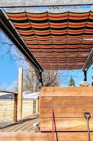 Orange And Blue Striped Wave Shades On Retractable Cables Pergola Shade Cover Pergola Shade Pergola