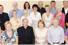 Happy couple honoured for 30 years' service