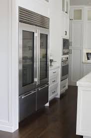 Exceptional Kitchen Features An Industrial Style Refrigerator With Two Glass Front Doors As Glass Door Refrigerator Glass Door Fridge Industrial Kitchen Design