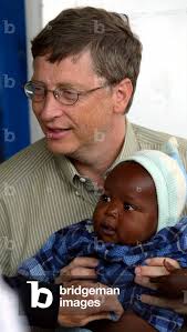 Image of Bill Gates holds baby boy Samuel Baltazar during his visit