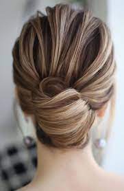 Here is an easy updo for formal events. A Chic And Elegant French Twist Updo With A Voluminous Top And An Elegant Knot Will Fit Medium Length French Twist Updo French Twist Hair Elegant Wedding Hair