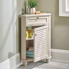 It is suitable for small spaces in the bathroom. Newport Louvered Corner Cabinet Corner Storage Cabinet Bedroom Storage Corner Storage