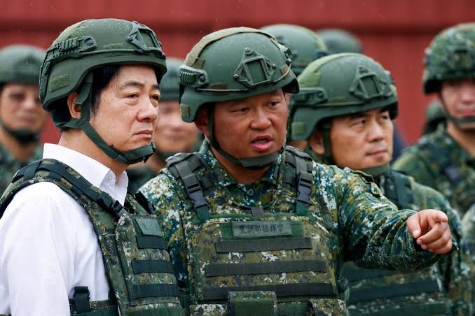 Taiwan president ups defence spending target to 5% of GDP | Reuters