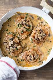 Then i poured in the nearly boiling bouillion being careful to keep the rice flat and under the pork chops and onions. Pork Chops In Creamy Mushroom Sauce Natashaskitchen Com