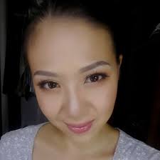 Makeup by Ann de Guzman added a...