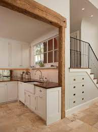 55 Amazing Space Saving Kitchens Under The Stairs In 2021 Stairs In Kitchen Space Saving Kitchen Farm House Living Room