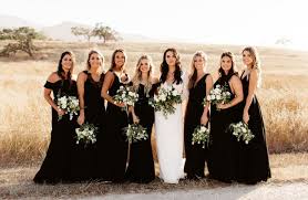 A Black Tie Affair Modern Countryside Wedding With Luxe Boho Accents Green Wedding Shoes Black Bridesmaid Dresses Black Bridesmaid Dress Mismatched Different Bridesmaid Dresses