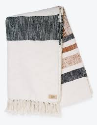 And we're not being overly dramatic here. Como Throw Blanket Rust Black Cream J Aim Jaimee Healy Jaimshoppe