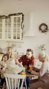 We're loving the expansive oslo dining table with easy wipe, yet chic black malmo chairs that can seat the entire family and more when you extend it. A Family Gathering In A Dining Table Showing Love And Care Among Each Other Free Stock Video