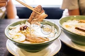 Remove the string and slice into thin pieces. Hand Pinching Chashu Pork In Ramen Pork Bone And Spicy Paste Leinwandbilder Bilder Kostlich Weiss Gemuse Myloview De