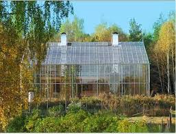 If the greenhouse can be used as patio this may extend the outdoor season. Boring Single Family House Covered With A Greenhouse Greenhouse Home Greenhouse Modern Greenhouse