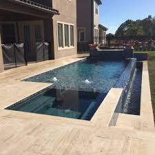 Infinity Pool With Hot Tub In Orlando Florida Infinity Pool Backyard Backyard Pool Landscaping Spa Pool