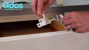 2 year old leeloo opens cabinet with ikea child lock. How To Baby Proof Your Drawers Without Drilling With Qdos Safety Adhesive Latches Youtube