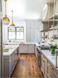 Benjamin moore's gray owl is a shade that can make white trim, cabinetry, and accents (think: Benjamin Moore Gray Huskie Kitchen Cabinets And Brass Fixtures Interiors By Color