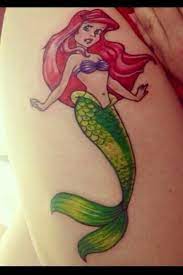 Disney the little mermaid ariel tattoo flash wallet 4.8 out of 5 stars 22 ratings. Ariel The Little Mermaid Tattoo Little Mermaid Tattoos Mermaid Tattoo Designs Disney Tattoos