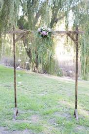 Dyi Wedding Arch Add A White Sheet Draped Over And Some Flowers Going Down Diy Wedding Arch Simple Wedding Arch Wedding Arch