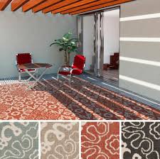 Outdoor furniture carpets rugs comprise an upper layer of pile inoculated into a backing material and could be woven, knitted or embroidered. How To Decorate Your Patio Area With A Rug Sunniland Patio Patio Furniture In Boca Raton
