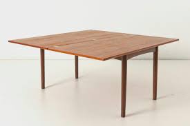 This coffee table that transforms into a dining room table. Danish Teak Convertible Coffee Table From Frem Rojle 1960s For Sale At Pamono