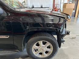 Image result for Black 2007 Envoy