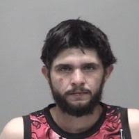 Kingman resident arrested in alleged parking lot assault