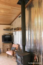 Remodelaholic Diy Corrugated Tin Wall Tutorial Corrugated Metal Wall Tin Walls Diy Wood Wall Paneling