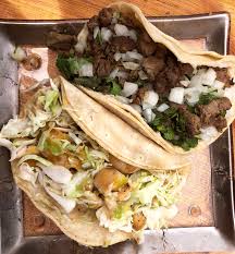 Top with the cabbage mixture, corn, fish, avocado, sour cream (1 tbsp light sour cream), coriander (fresh coriander leaves, to serve) and chilli (thinly. Laguna Dining Archive