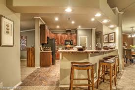 The interior boasts an open living and dining area with a cathedral ceiling and even a bar option. Pictures Photos And Videos Of Manufactured Homes And Modular Homes Palm Harbor Homes