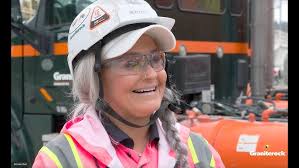 In the driver's seat with a mixer truck driver who knows her mud