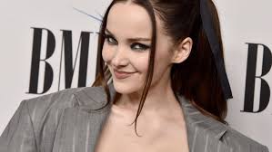 Dove Cameron Pairs Sheer Corset With Oversized Suit for BMI Pop Awards