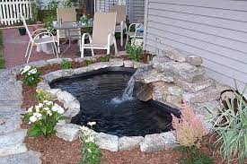 25 Cheap Diy Ponds To Bring Life To Your Garden Decoist Garden Pond Design Small Backyard Ponds Ponds Backyard