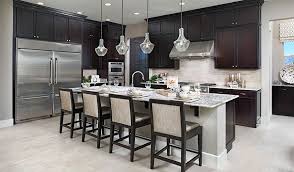 Just Look At The Size Of The Refrigerator In This Elegant Las Vegas Nv Kitchen Hanford Plan By Log Home Kitchens Beautiful Kitchen Cabinets Home Kitchens