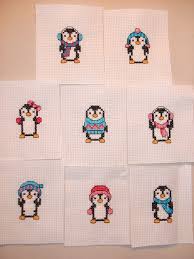Cross stitch kit featuring a penguin relaxing on vacation. Cross Stitch A To Z Penguins