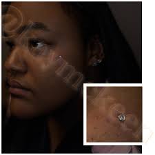 Body piercer at Liquid Chaos in Brownstown