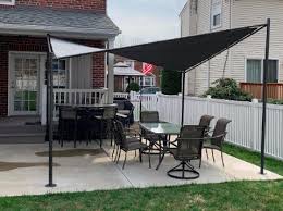 Thread the curtain rod through the pocket of the shade and hang on the installed hardware. 23 Cool Ways To Add Shade To Your Backyard