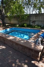 A Mix Of Sun And Shade For This Endless Pool Easily Adjust The Water Temperature No Matter The Season Endless Pool Endless Pool Backyard Backyard Pool Designs