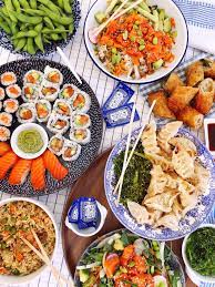 For sushi night, you should focus on serving different types of sushi, like nigiri, sashimi, and maki. Sushi Night At Home Domestikatedlife Sushi Dinner Sushi Night Dinner Party Appetizers