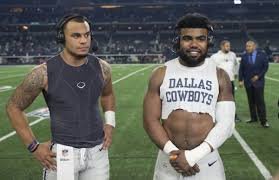 The shoulder of the player contains another tattoo done in the style of a statue but is of an angel. Look Rb Ezekiel Elliott With New Full Sleeve Tattoo