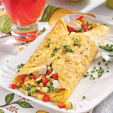 Une Omelette Remplie De Delicieux Legumes Et De Cubes De Fromage Fondant Mia Food Cooking Recipes Breakfast Brunch