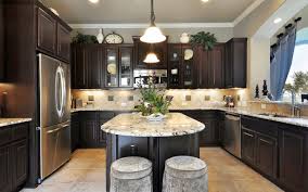 While you can choose to have all white elements in your kitchen, such as white cabinets and white countertops, there are also with its dark grey tones, you can contrast white cabinetry without selecting brown or black quartz. Modern Kitchen With Dark Brown Cabinets Novocom Top