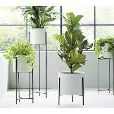 Dundee Low White Planter With Stand Reviews Crate And Barrel White Planters Tall Indoor Plants Modern Plant Stand Homey oh my created this modern plant stand that works wonders for chic studio apartments or contemporary homes.