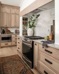 The hardest working accent in your home, kitchen islands tuck away server, assist with food prep, and offer a convenient spot to set out. White Oak Kitchen Kelsey Leigh Design Co Novero Homes And Renovations