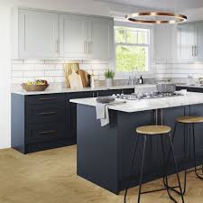 Light blue cabinets make sweet balance to the tiled wall. Navy Kitchen Ideas To Add An Element Of Rich Colour And Sophistication