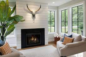 While looking for ideas we came across shiplap fireplaces, but the expense of actual shiplap wasn't in then, apply one coat of flat white paint to the plywood planks using a roller. Shiplap Fireplace Wall With Metal Stag Head Transitional Living Room