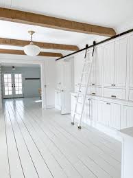 Ceiling beams painted the same color as the ceiling blend into the surrounding area, adding very little to the decor. Our New Library Room Faux Wood Beams Liz Marie Blog