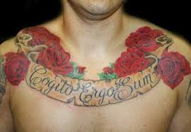 The tattoo has a liquid background of black ink that fades into red. 100 Nice Chest Tattoo Ideas Cuded