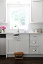 Gorgeous Kitchen With White Shaker Cabinets Painted Benjamin Moore Cloud White Paired New Kitchen Cabinets Kitchen Inspirations Painting Kitchen Cabinets White