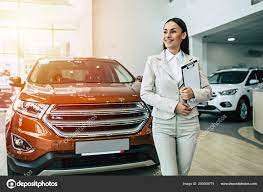 Beautiful Smiling Saleswoman Suit Standing Documents Dealership Cars  Background – Stock Editorial Photo © saragolfart@gmail.com #200608774